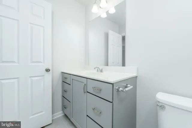 a view of a room with wooden walls