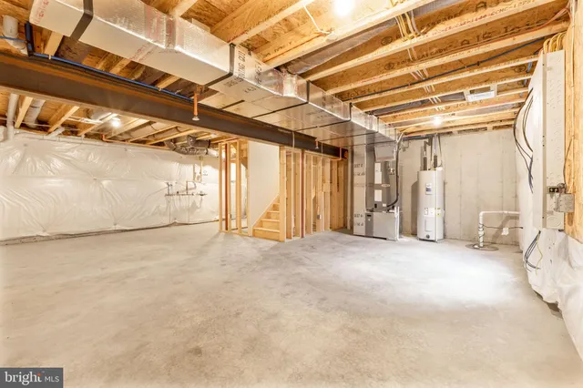 a picture of a bench in front of a building