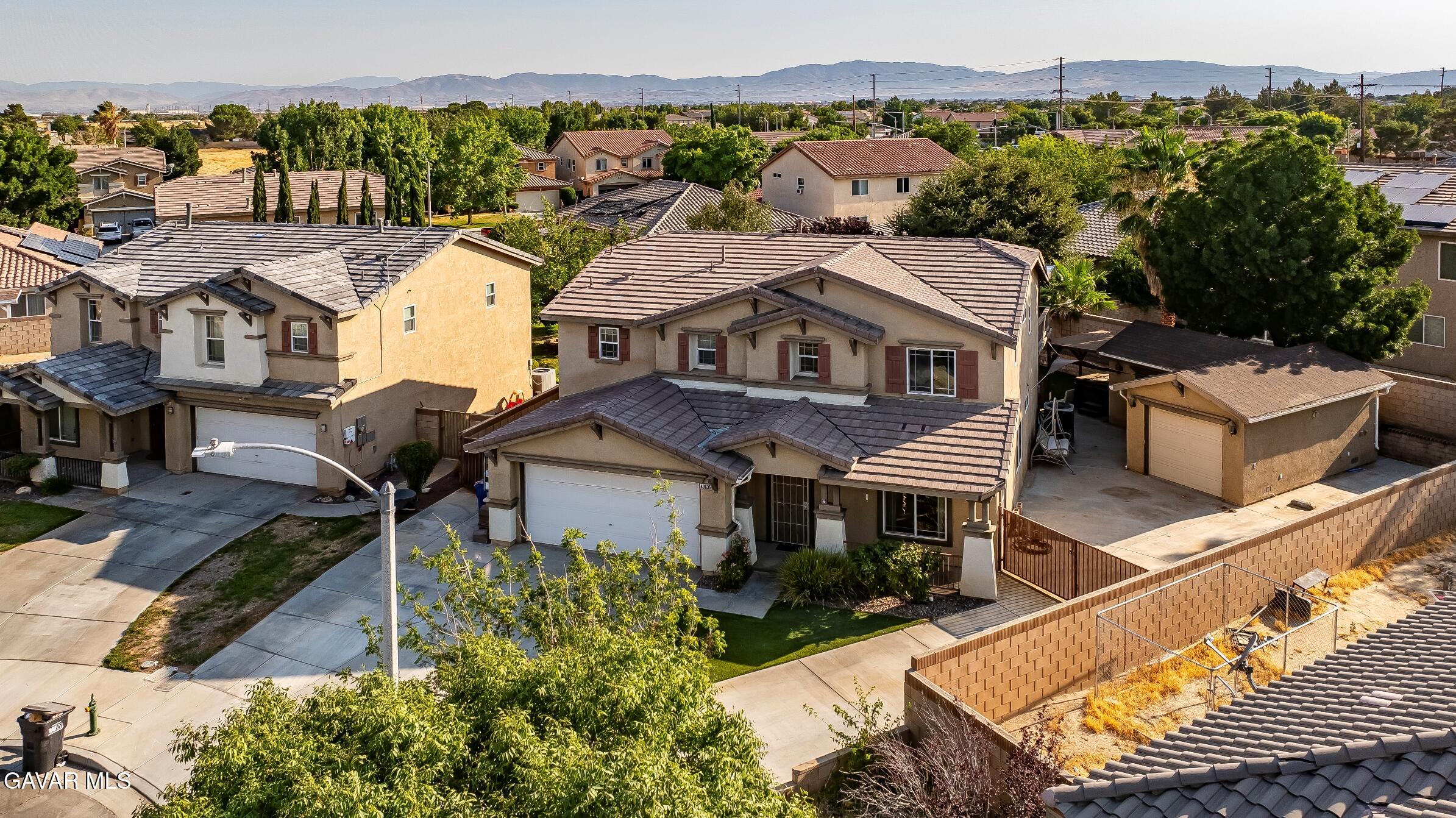 43635 Castle Circle Lancaster, CA 93535 - Photo 47 of 53 an aerial view of a house with a garden