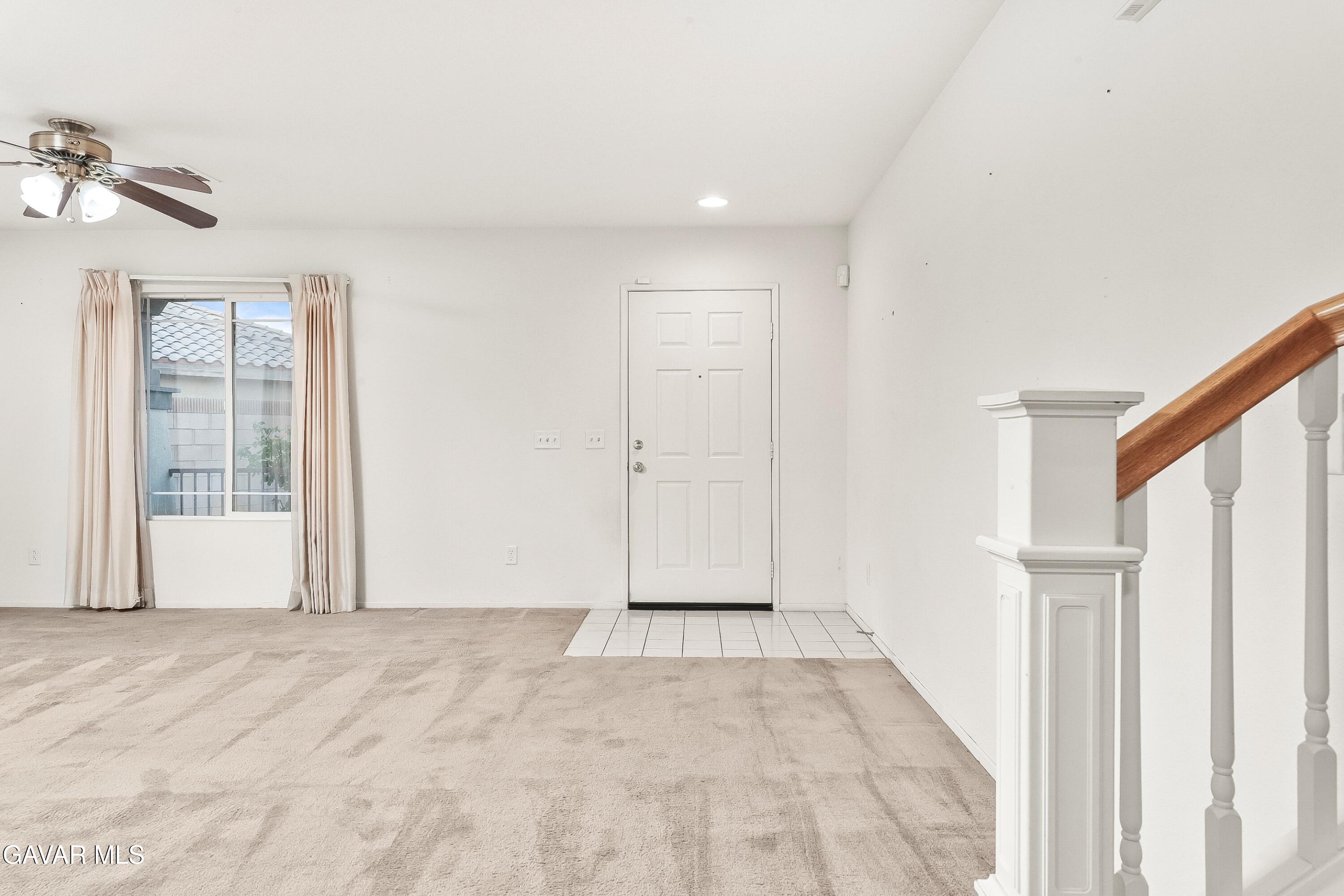 43635 Castle Circle Lancaster, CA 93535 - Photo 8 of 53 a view of an empty room with a window
