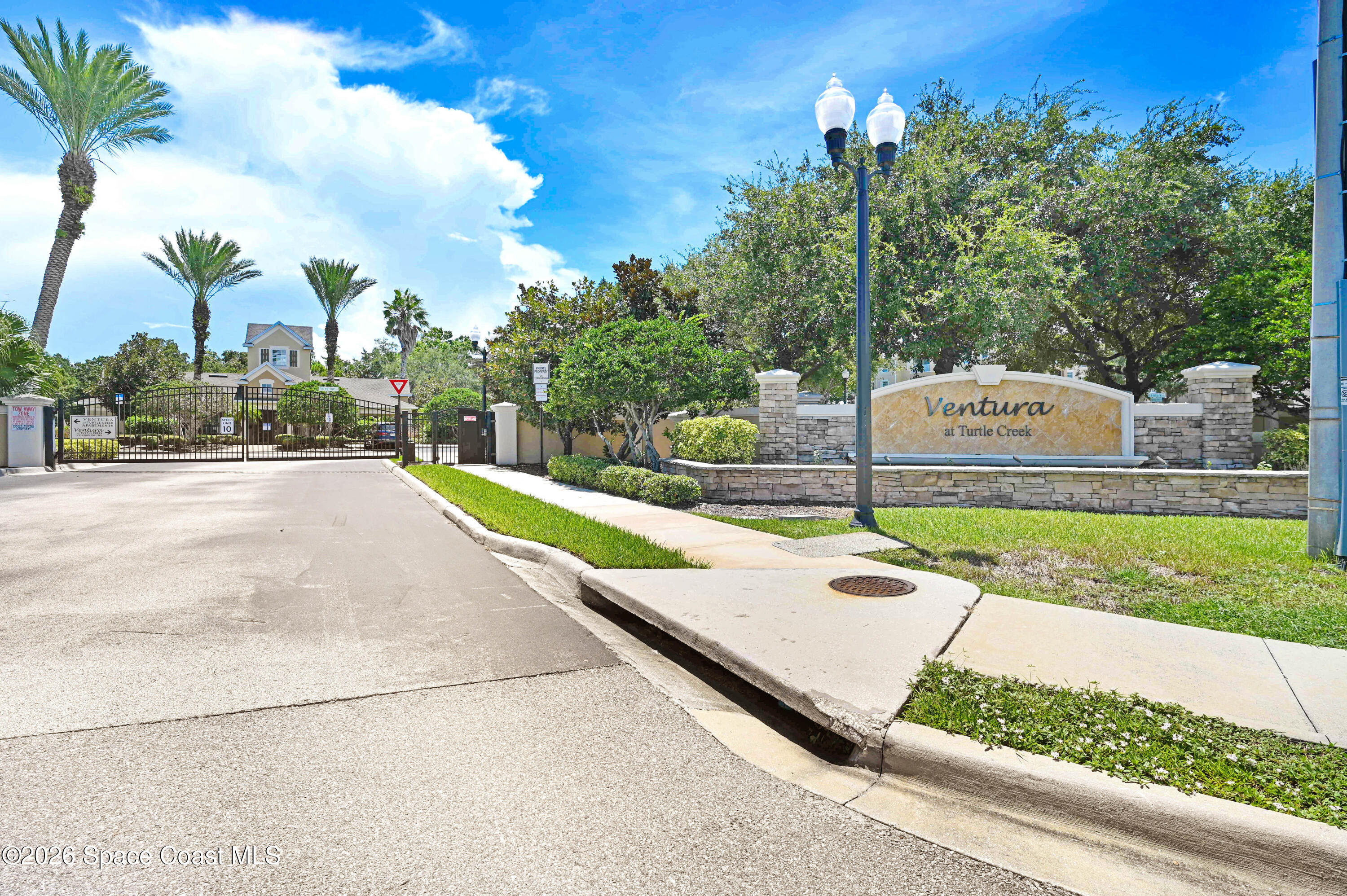 3848 Lexmark Lane, Unit 210 Rockledge, FL 32955 - Photo 44 of 44 Enty sign & gates
