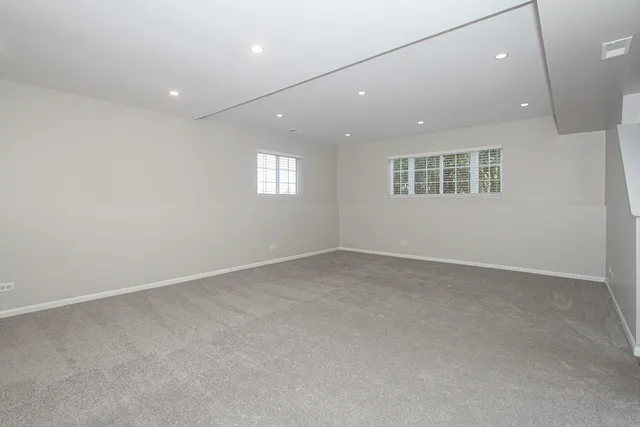 a view of a lake with a yard