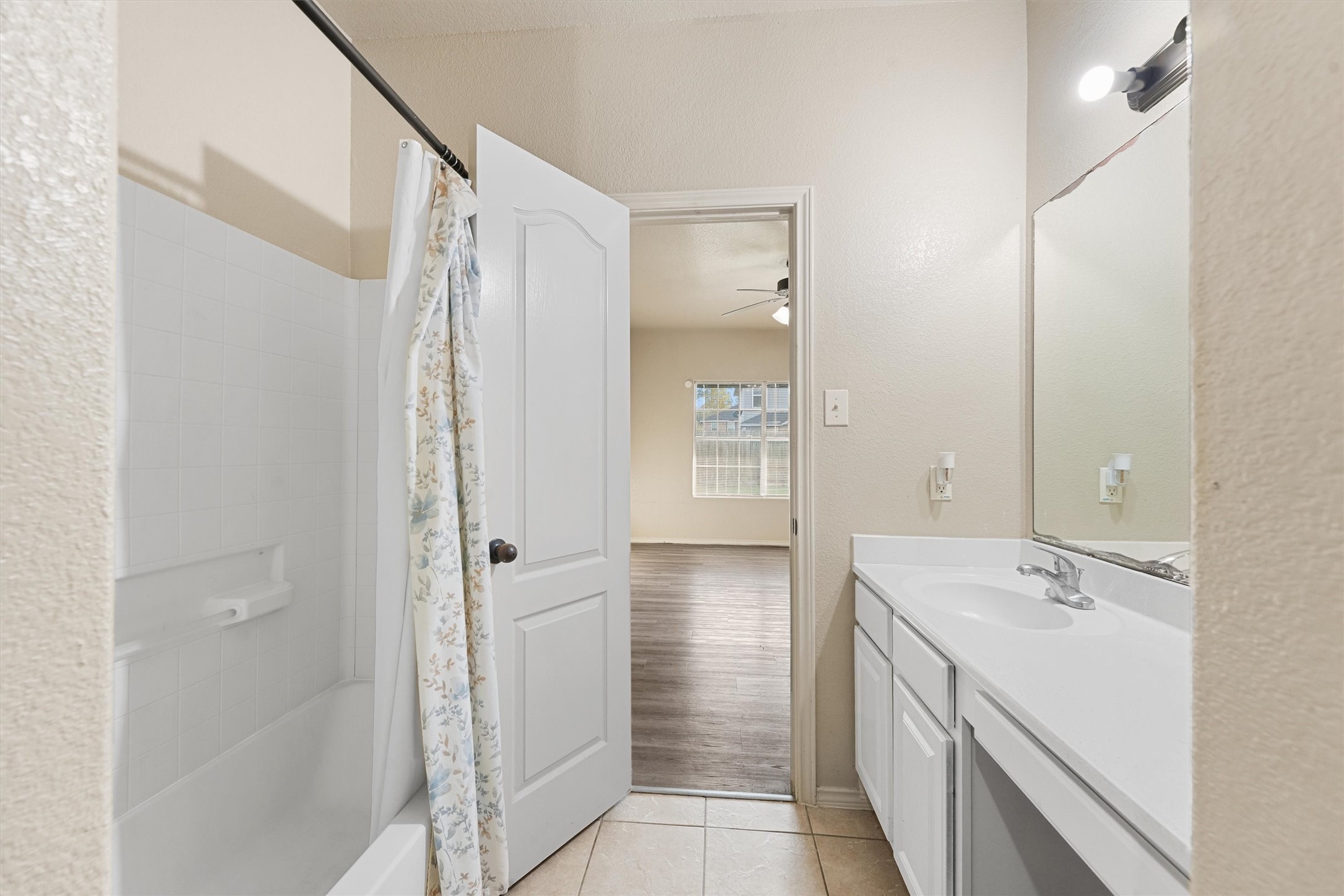 3114 Trinity Joe Lane Humble, TX 77396 - Photo 18 of 28 a bathroom with a sink and a mirror