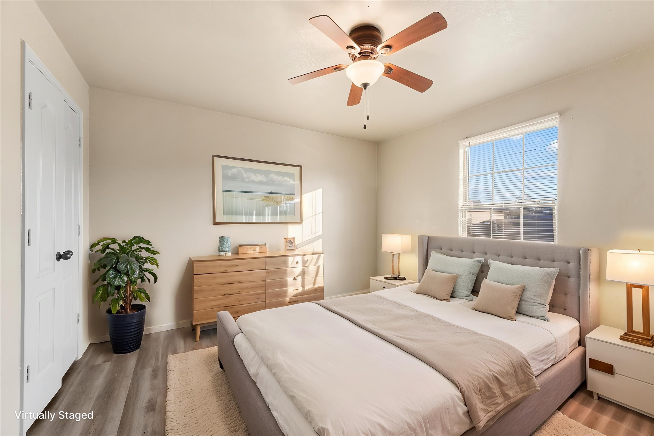 3114 Trinity Joe Lane Humble, TX 77396 - Photo 2 of 28 a bedroom with a bed and a chandelier