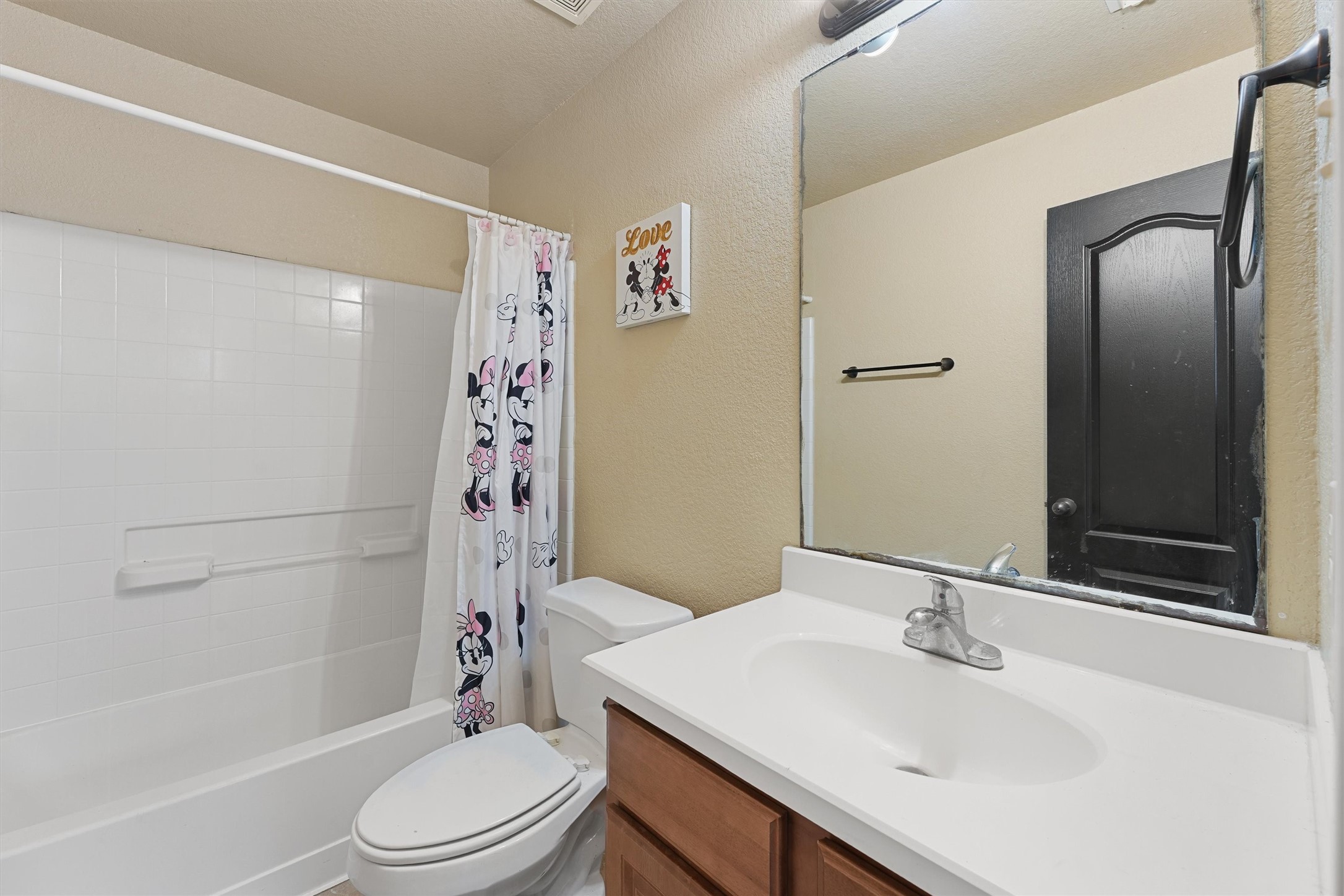 3114 Trinity Joe Lane Humble, TX 77396 - Photo 22 of 28 a bathroom with a sink a toilet and shower