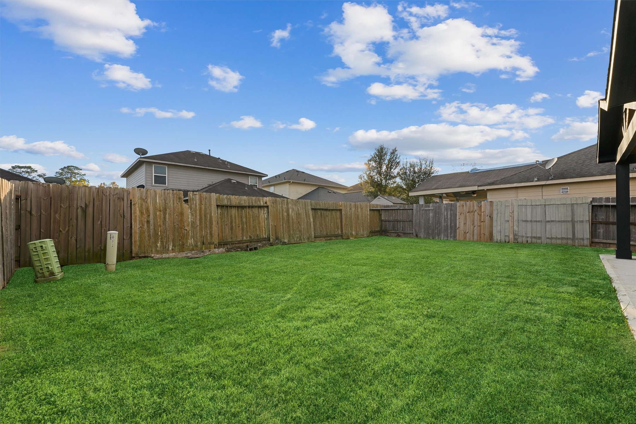 3114 Trinity Joe Lane Humble, TX 77396 - Photo 27 of 28 a view of a backyard with wooden fence