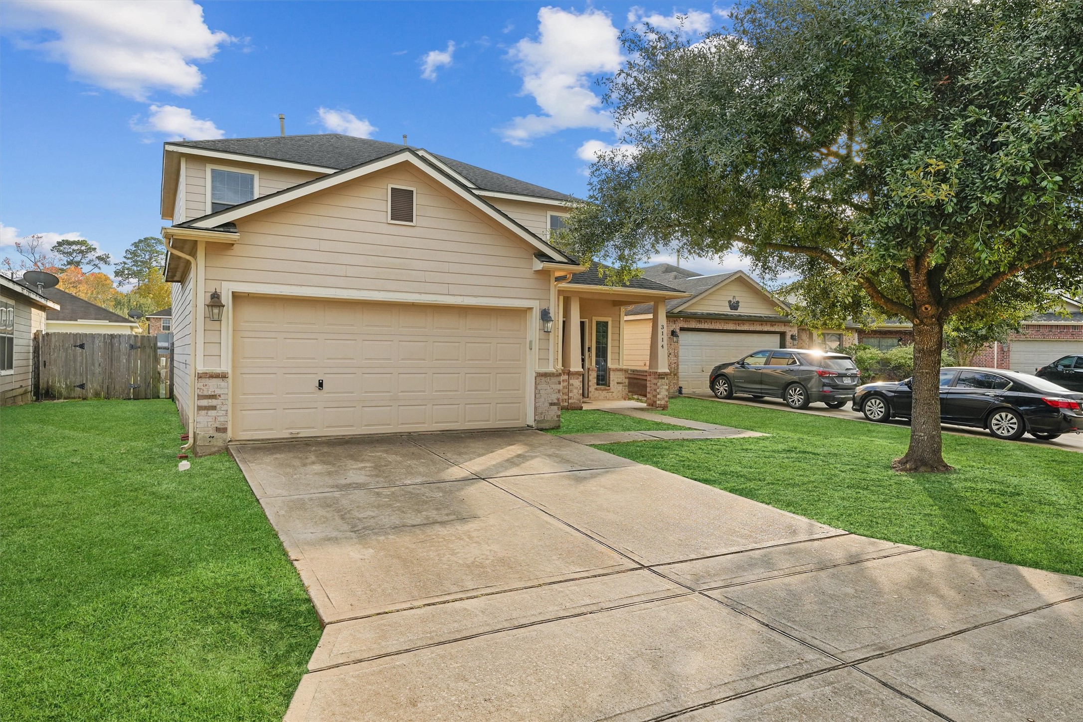 3114 Trinity Joe Lane Humble, TX 77396 - Photo 7 of 28 a front view of house with yard and green space