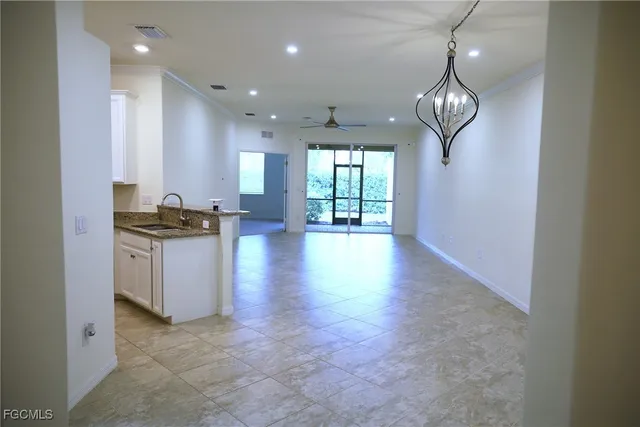 a view of kitchen and windows