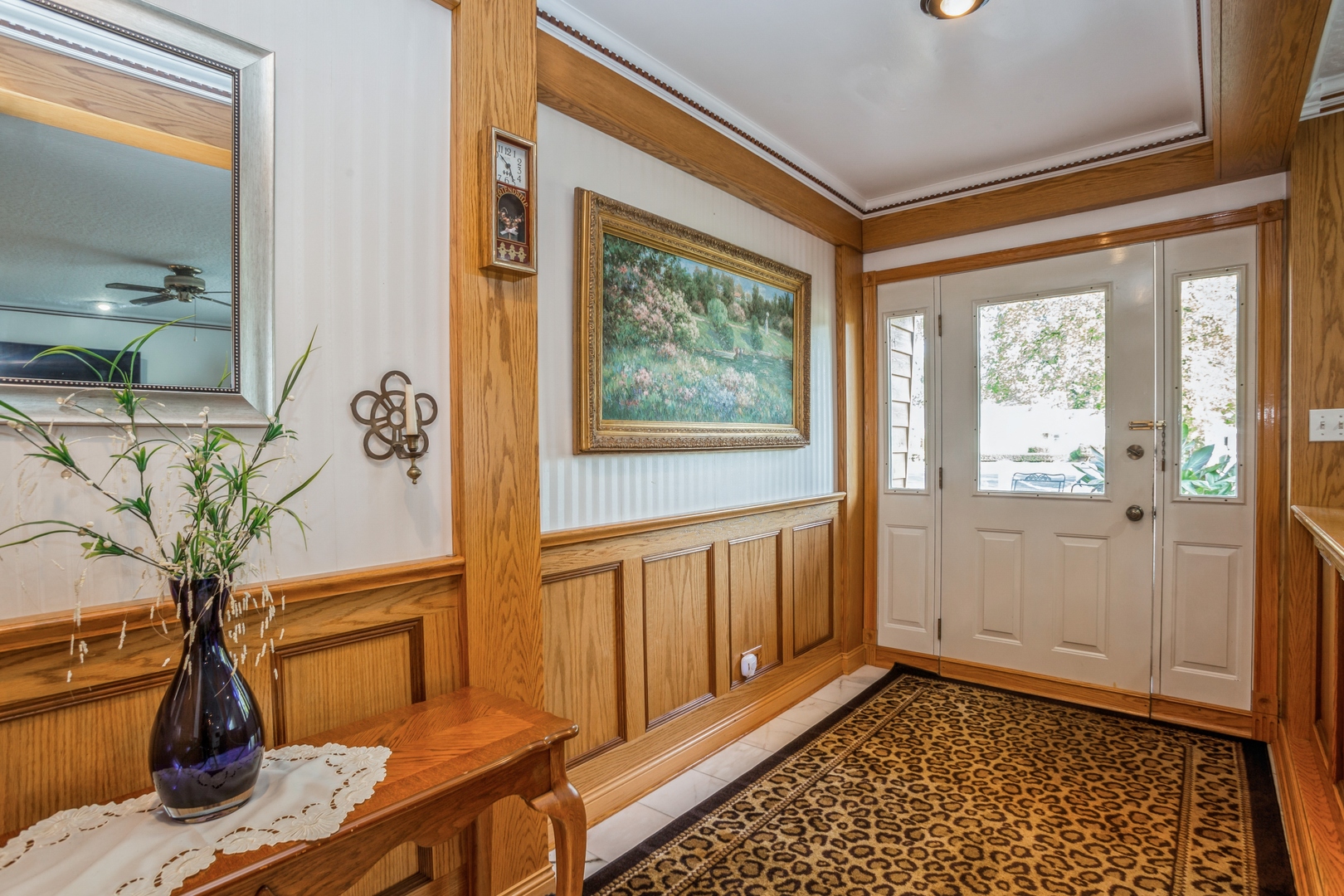 613 West Edgewood Road Lombard, IL 60148 - Photo 2 of 21 a view of a bedroom with wooden floor and a window