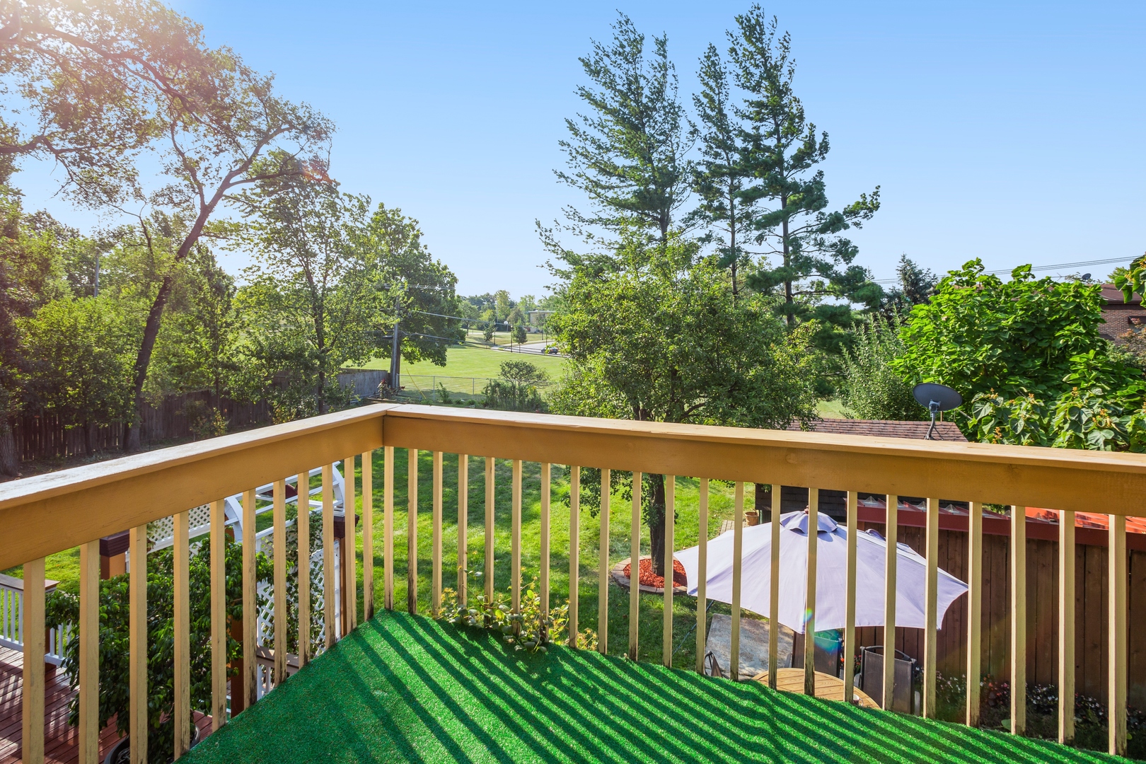613 West Edgewood Road Lombard, IL 60148 - Photo 17 of 21 a view of a wooden roof deck