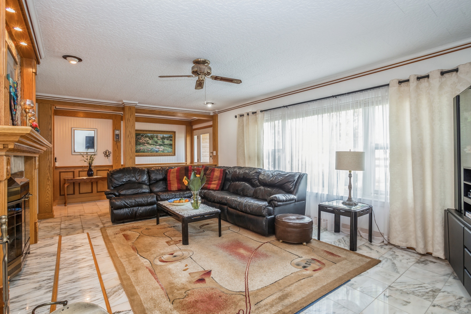 613 West Edgewood Road Lombard, IL 60148 - Photo 3 of 21 a living room with furniture and a window