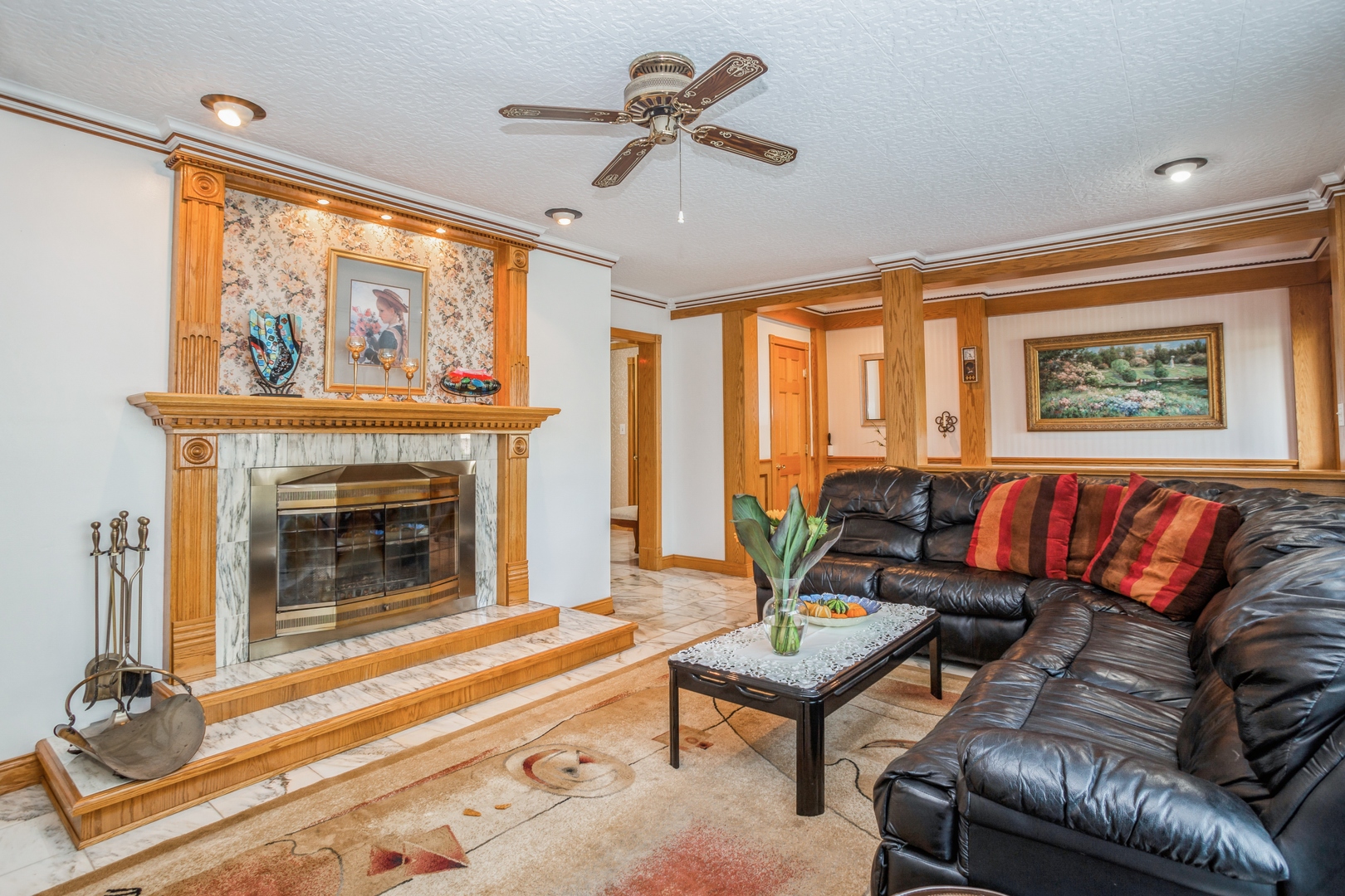 613 West Edgewood Road Lombard, IL 60148 - Photo 4 of 21 a living room with furniture a fireplace and a large window