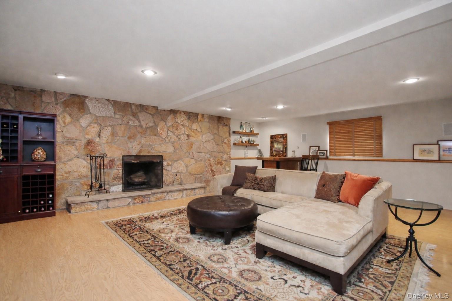102 Nicholson Road Holmes, NY 12531 - Photo 32 of 44 Lower Level Family Room with Stone Fireplace