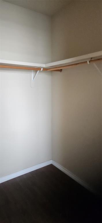 1100 West Trinity Mills Road, Unit 3003 Carrollton, TX 75006 - Photo 22 of 26 a view of an empty walk in closet