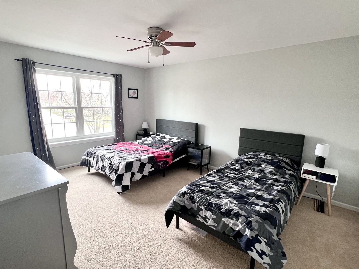 407 Post Oak Circle West Chicago, IL 60185 - Photo 15 of 23 a bedroom with bed couch and window
