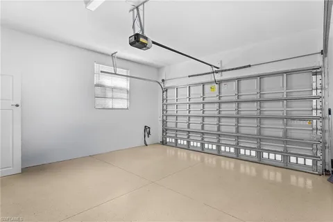 a view of an empty room with windows