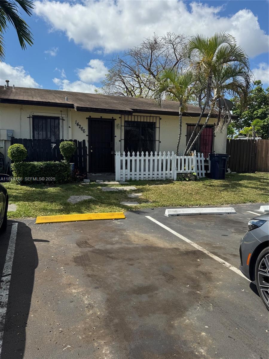 28152 Southwest 142nd Court Homestead, FL 33033 - Photo 9 of 12 a view of a house with swimming pool and a yard
