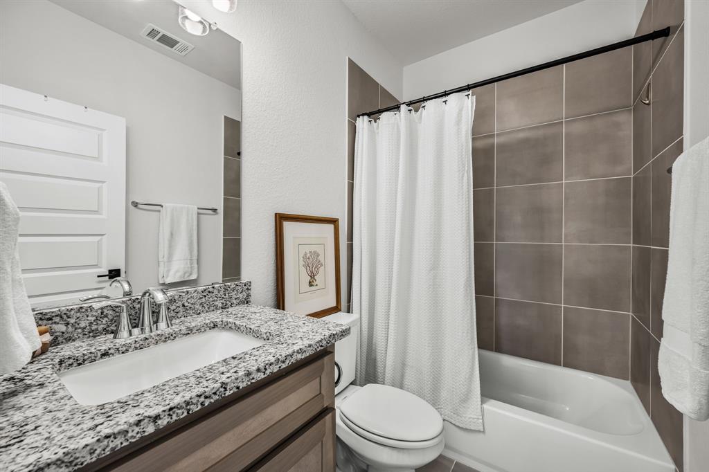 5621 Evans Road The Colony, TX 75056 - Photo 16 of 25 Upstairs Bathroom