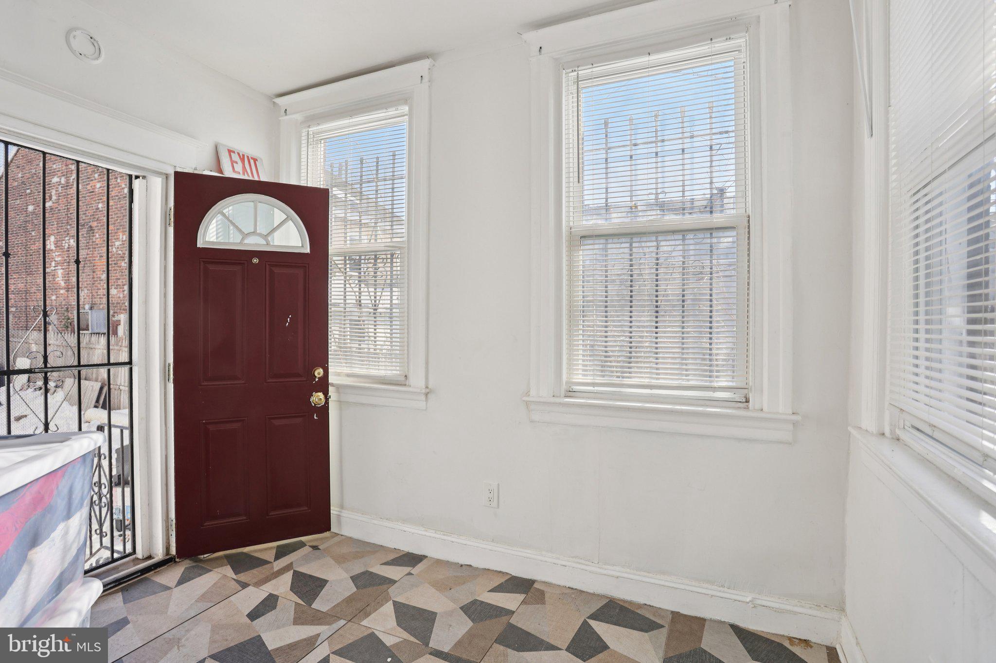 1540 Adams Avenue Philadelphia, PA 19124 - Photo 30 of 43 an empty room with windows and closet