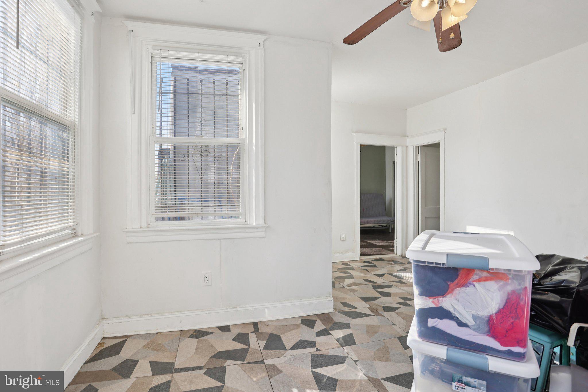 1540 Adams Avenue Philadelphia, PA 19124 - Photo 31 of 43 a room with furniture and a window