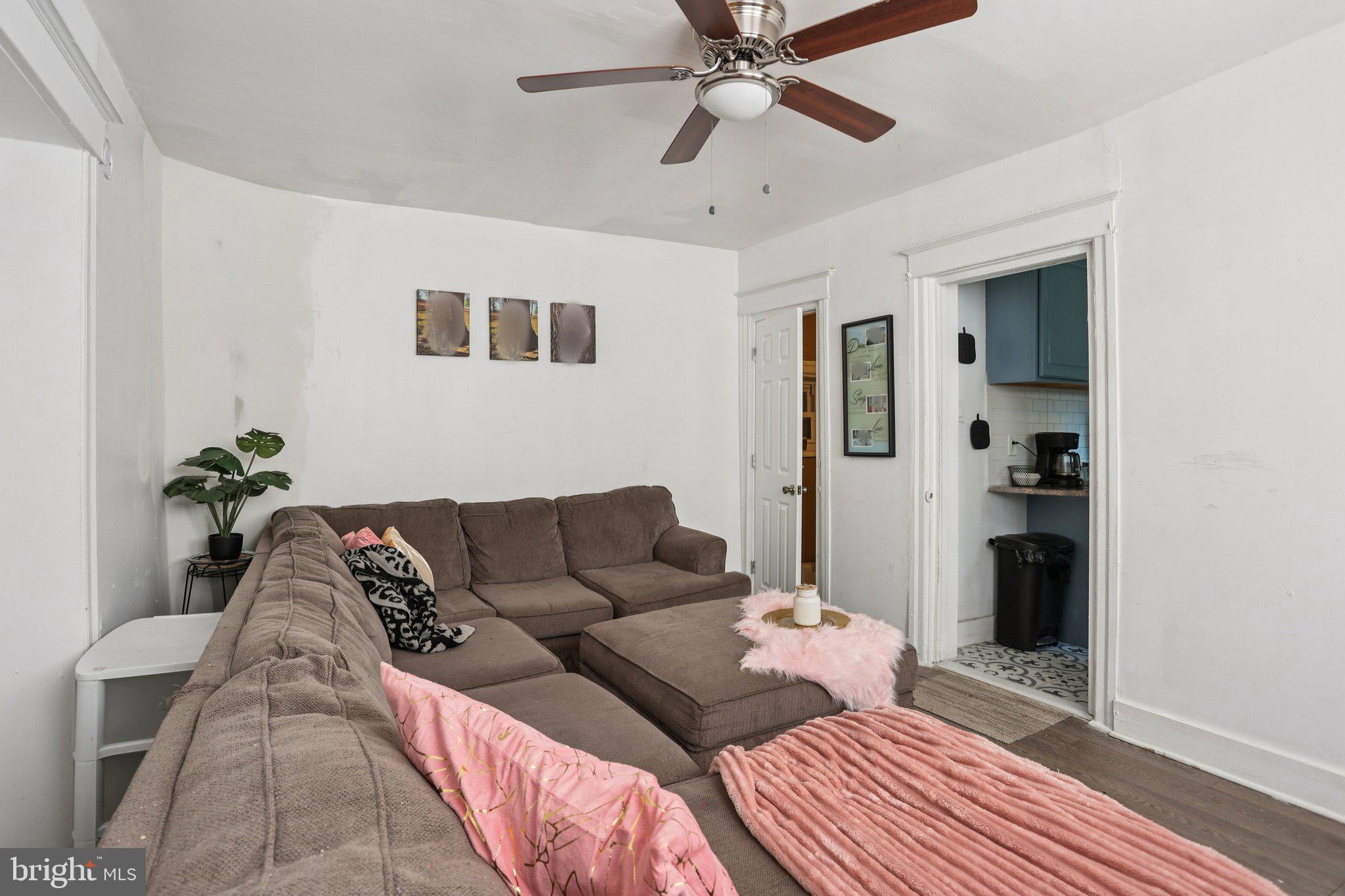 1540 Adams Avenue Philadelphia, PA 19124 - Photo 10 of 43 a living room with furniture and a rug