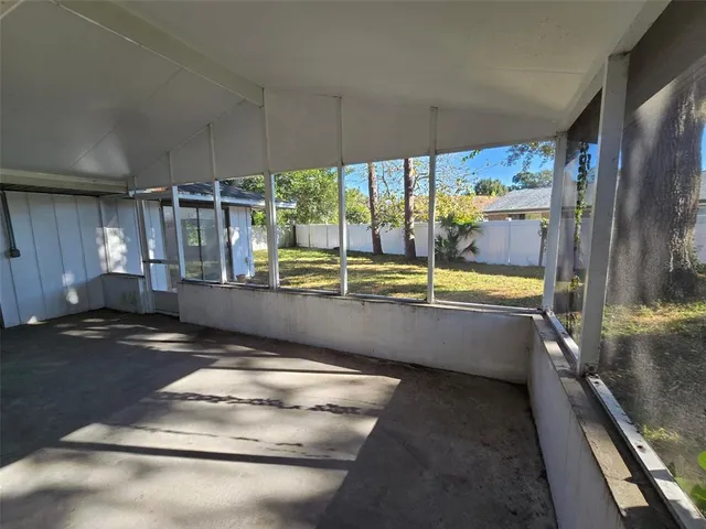 a view of a hallway with a white walls