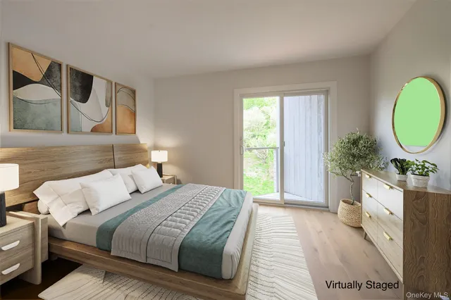 a bed room with a bed mirror and a window