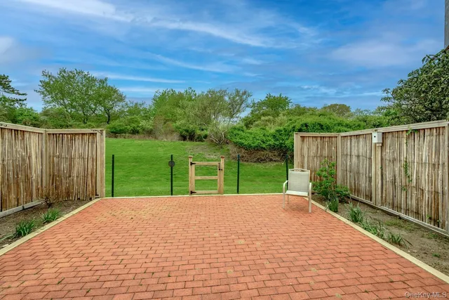 a view of a backyard with a garden