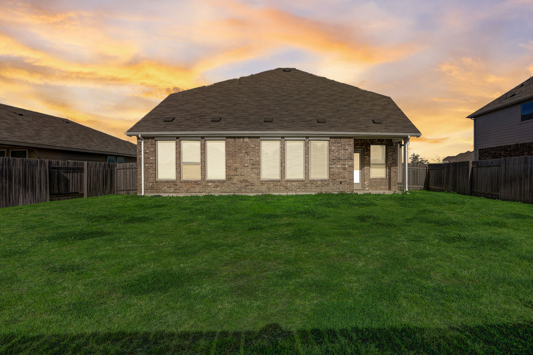 308 Monteforte Road Hutto, TX 78634 - Photo 32 of 32 a front view of a house with a yard