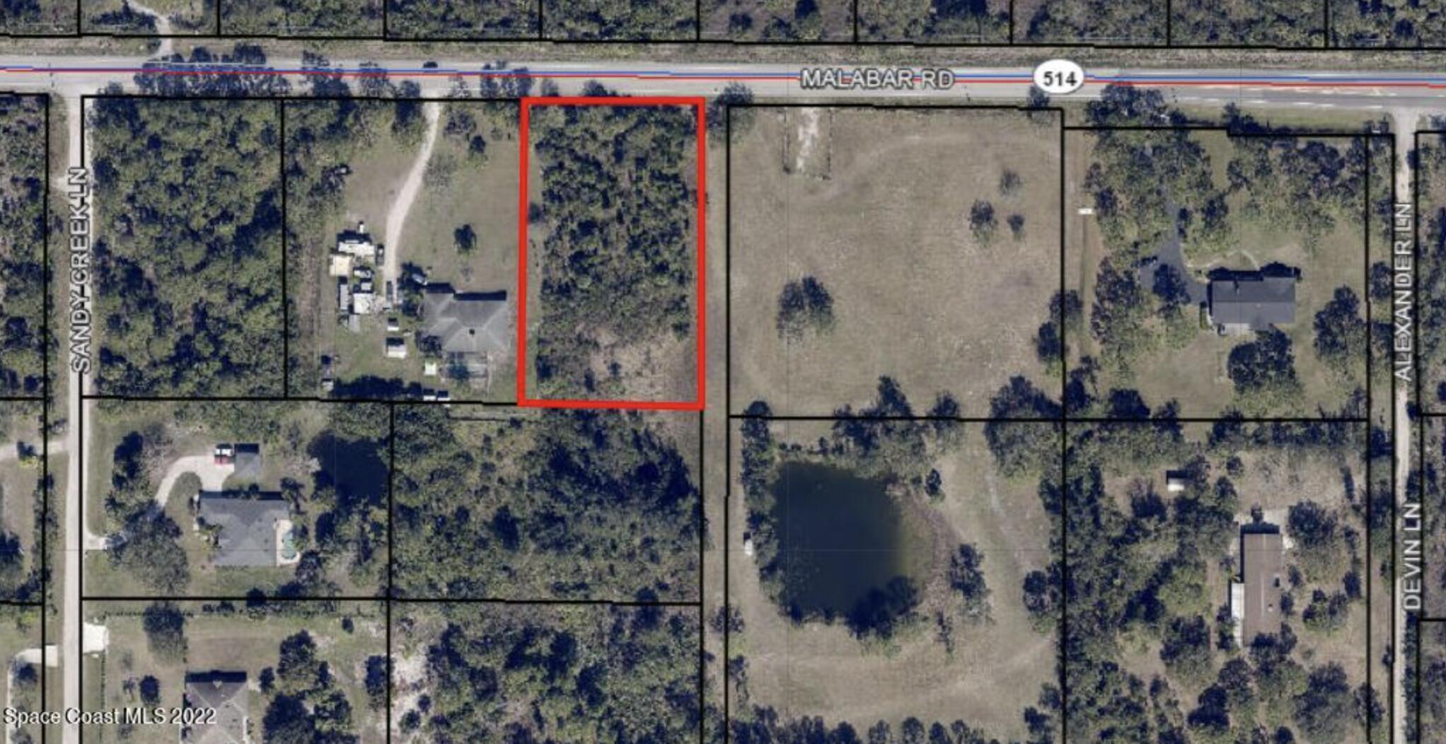 0 Unknown Road Malabar, FL 32950 - Photo 4 of 4 a bird view of a house