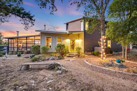 a view of a yard with trees