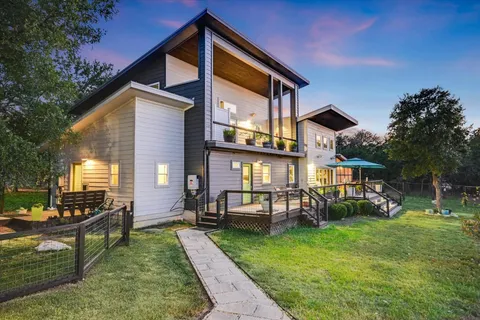 a outdoor living space with patio furniture and a potted plant