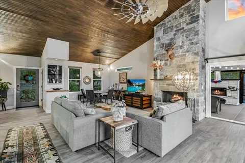 a bathroom with a sink a mirror and shower