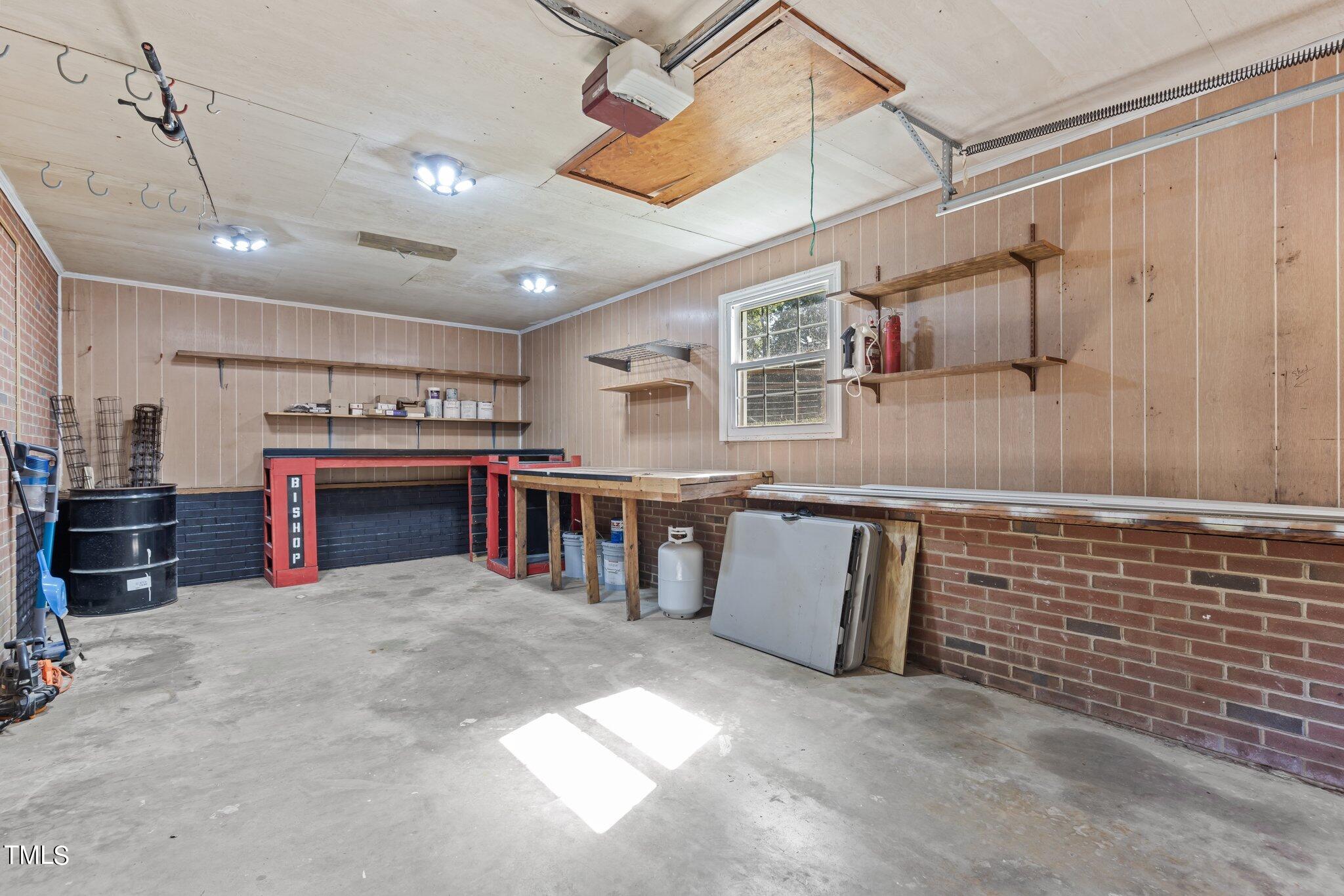 1224 Hedrick Drive Henderson, NC 27537 - Photo 32 of 32 a view of an empty room with a fireplace