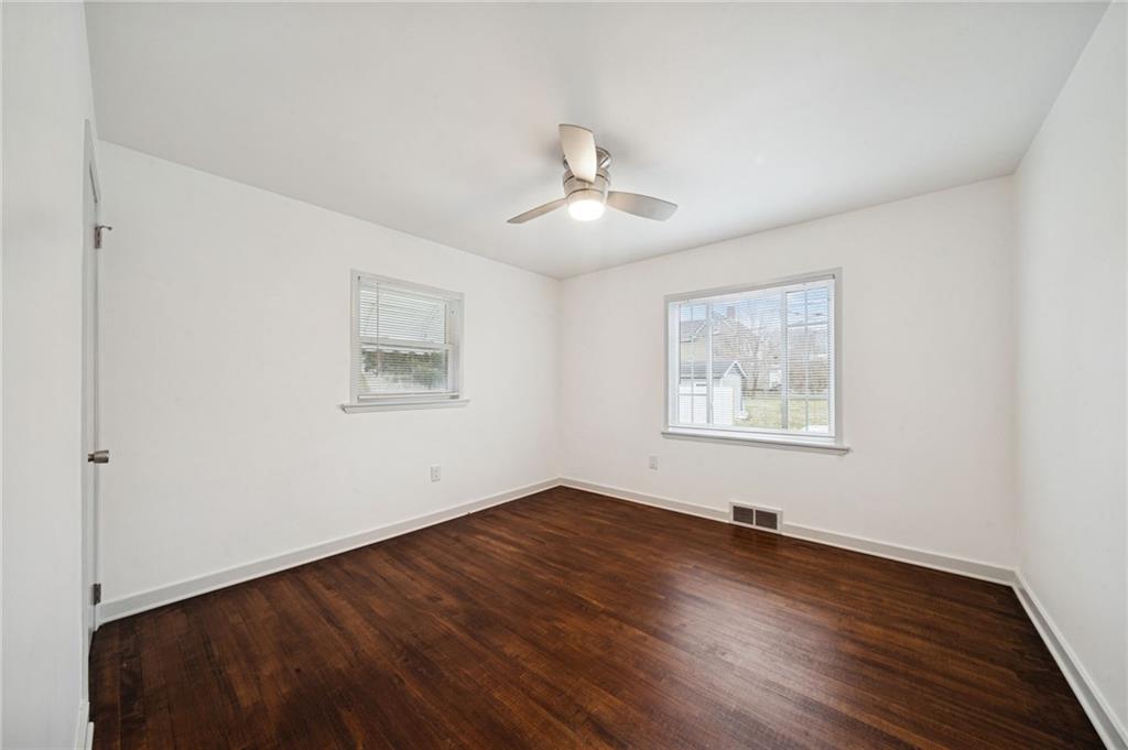 253 Stewart Street Elizabeth, PA 15037 - Photo 13 of 23 a view of empty room with wooden floor and fan
