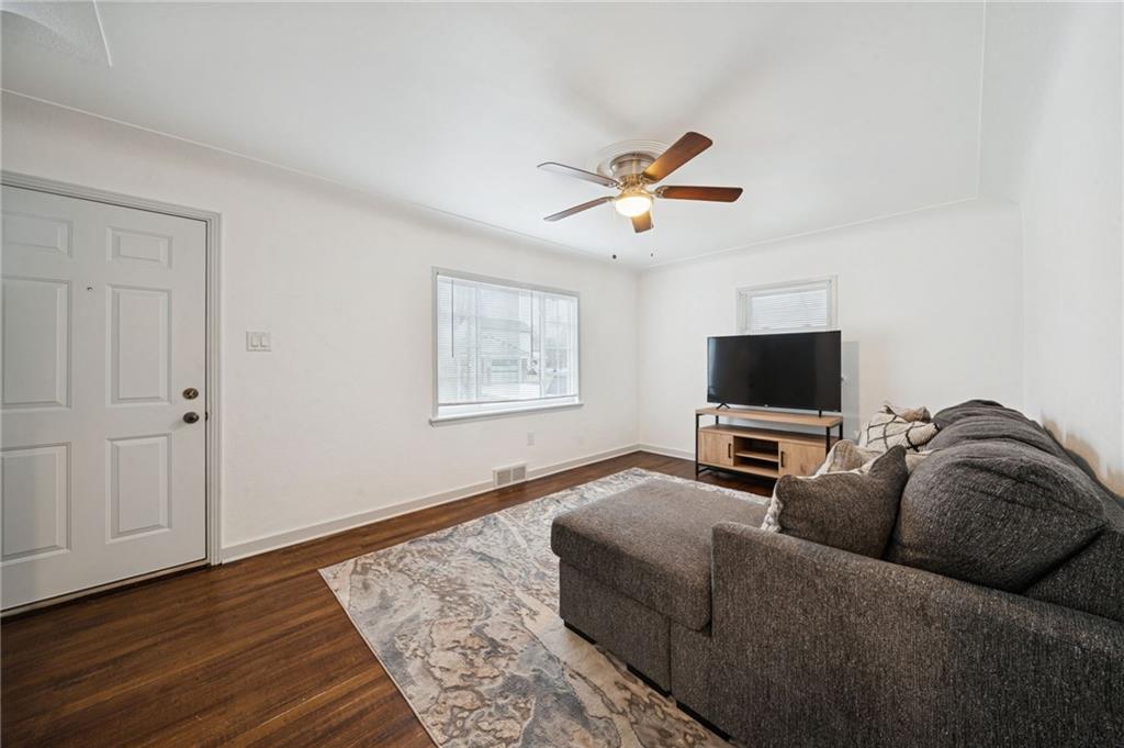 253 Stewart Street Elizabeth, PA 15037 - Photo 5 of 23 a living room with furniture and a flat screen tv