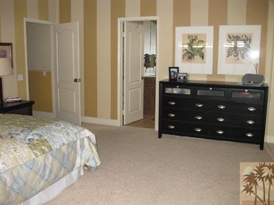 68 Oak Tree Drive Rancho Mirage, CA 92270 - Photo 11 of 23 a bedroom with a bed and a mirror