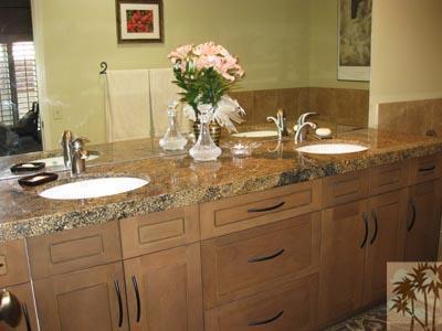 68 Oak Tree Drive Rancho Mirage, CA 92270 - Photo 13 of 23 a bathroom with a granite countertop sink a mirror and vanity