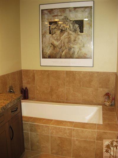 68 Oak Tree Drive Rancho Mirage, CA 92270 - Photo 14 of 23 a bathroom with a bathtub