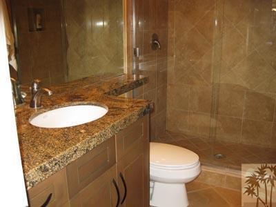68 Oak Tree Drive Rancho Mirage, CA 92270 - Photo 16 of 23 a bathroom with a sink a toilet and shower