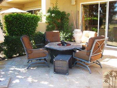 68 Oak Tree Drive Rancho Mirage, CA 92270 - Photo 17 of 23 a outdoor space with patio couch and a fire pit