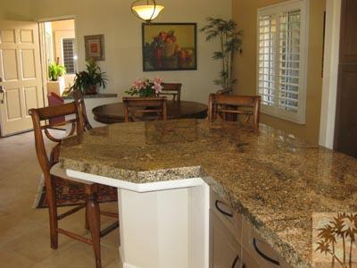 68 Oak Tree Drive Rancho Mirage, CA 92270 - Photo 4 of 23 a dining table with chairs and window