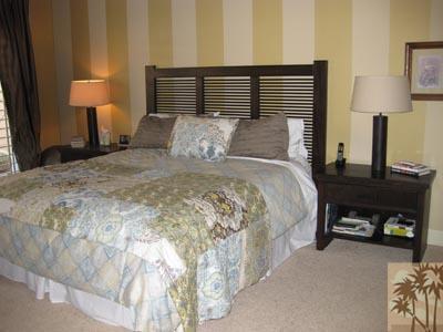 68 Oak Tree Drive Rancho Mirage, CA 92270 - Photo 10 of 23 a large bed sitting in a bedroom next to a lamp