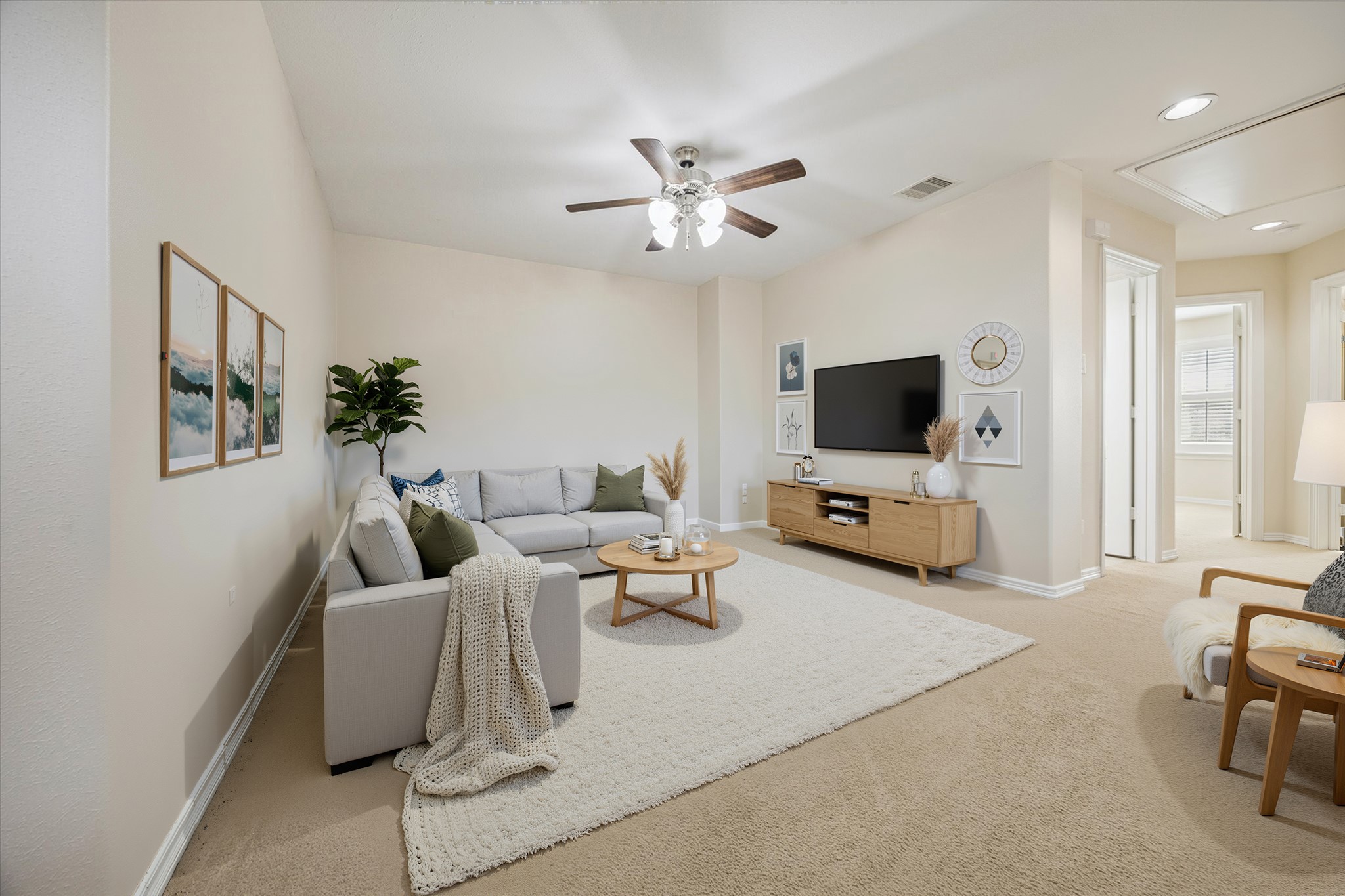 1113 Peden Street, Unit B Houston, TX 77006 - Photo 15 of 19 a living room with furniture and a flat screen tv