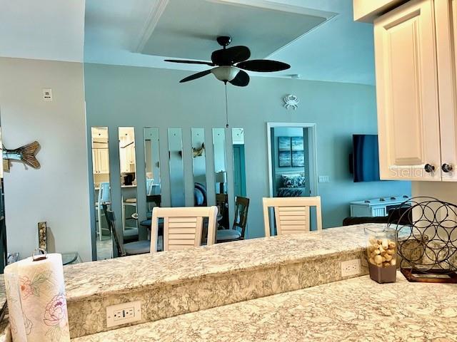 2060 Matecumbe Key Road, Unit 2102 Punta Gorda, FL 33955 - Photo 14 of 51 a bedroom with a bed and a chandelier