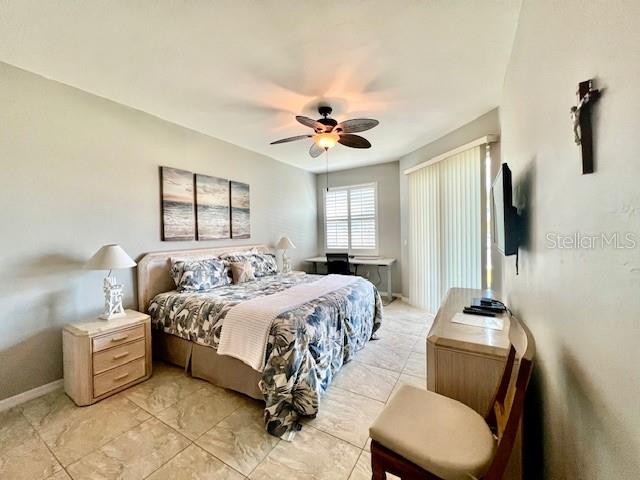 2060 Matecumbe Key Road, Unit 2102 Punta Gorda, FL 33955 - Photo 18 of 51 a bedroom with bed and a window