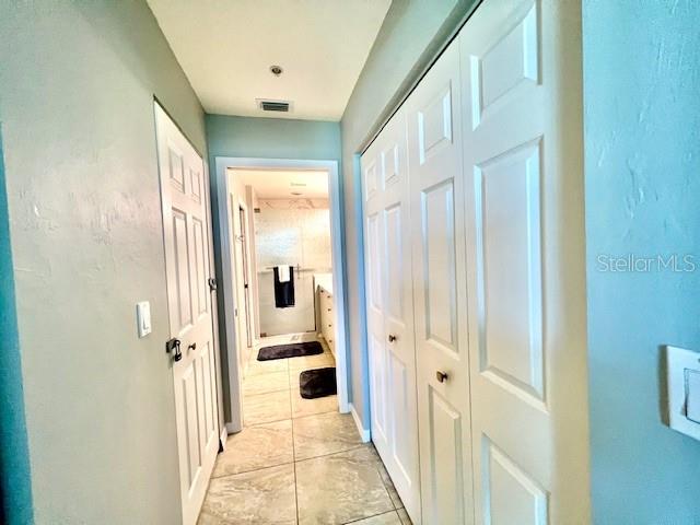 2060 Matecumbe Key Road, Unit 2102 Punta Gorda, FL 33955 - Photo 22 of 51 a view of a hallway with a dining area