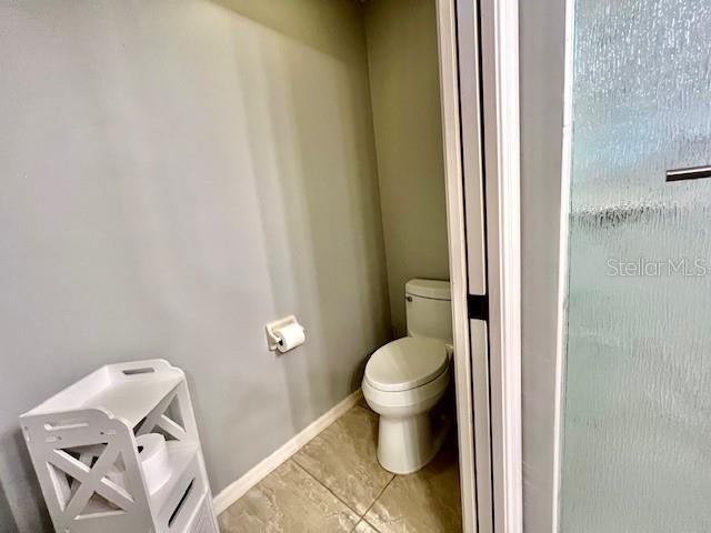 2060 Matecumbe Key Road, Unit 2102 Punta Gorda, FL 33955 - Photo 26 of 51 a bathroom with a toilet and a shower