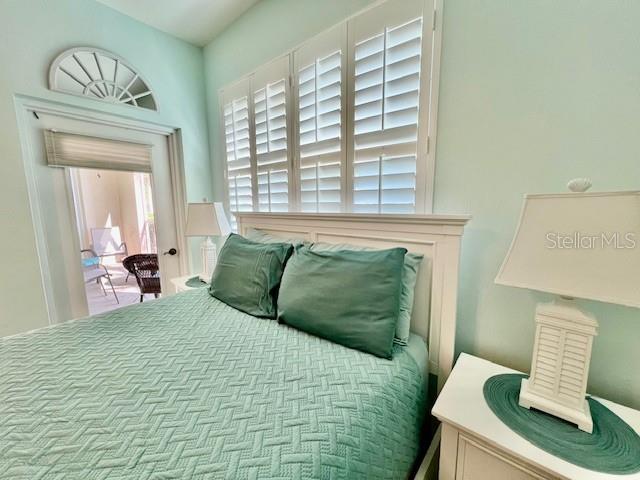2060 Matecumbe Key Road, Unit 2102 Punta Gorda, FL 33955 - Photo 30 of 51 a bedroom with a bed and window