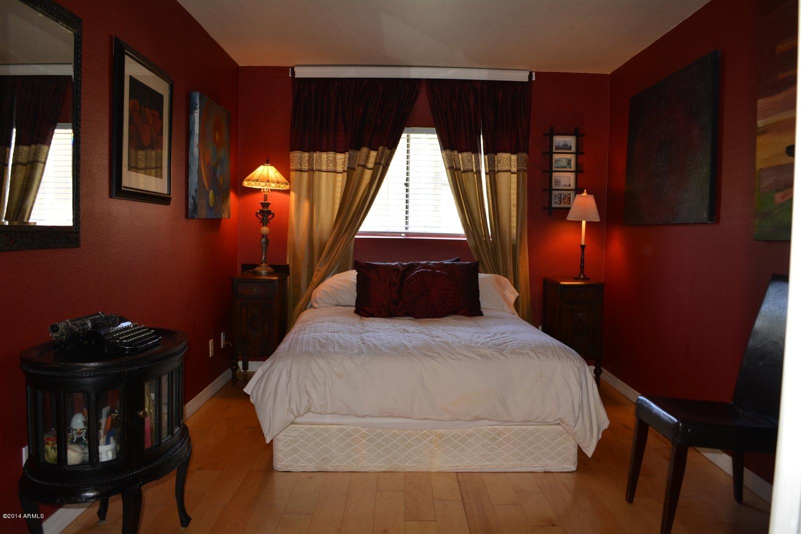 5401 East Thomas Road, Unit 1032 Phoenix, AZ 85018 - Photo 1 of 34 a bedroom with a bed and window